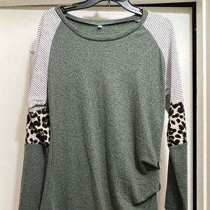 Olive green, animal print and striped women’s size medium long sleeve shirt.